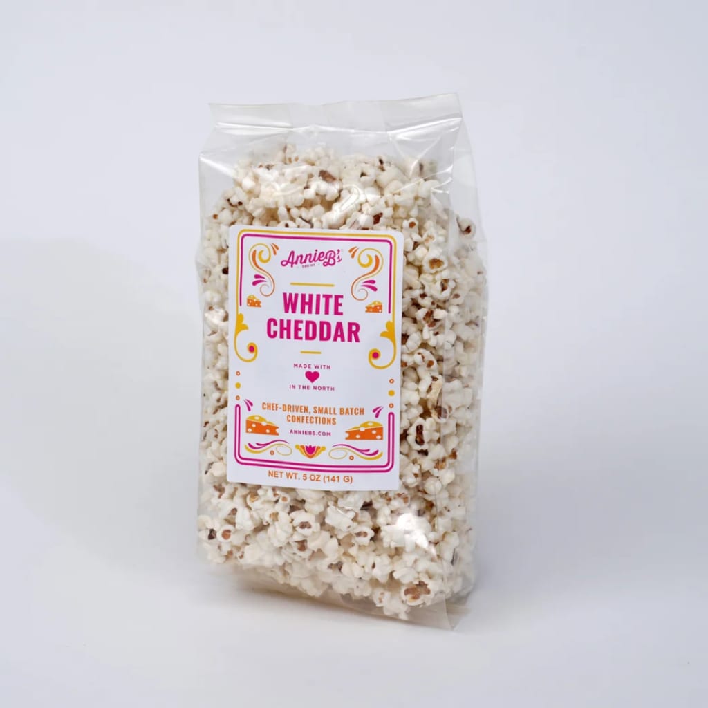 Bag of white cheddar popcorn in clear packaging