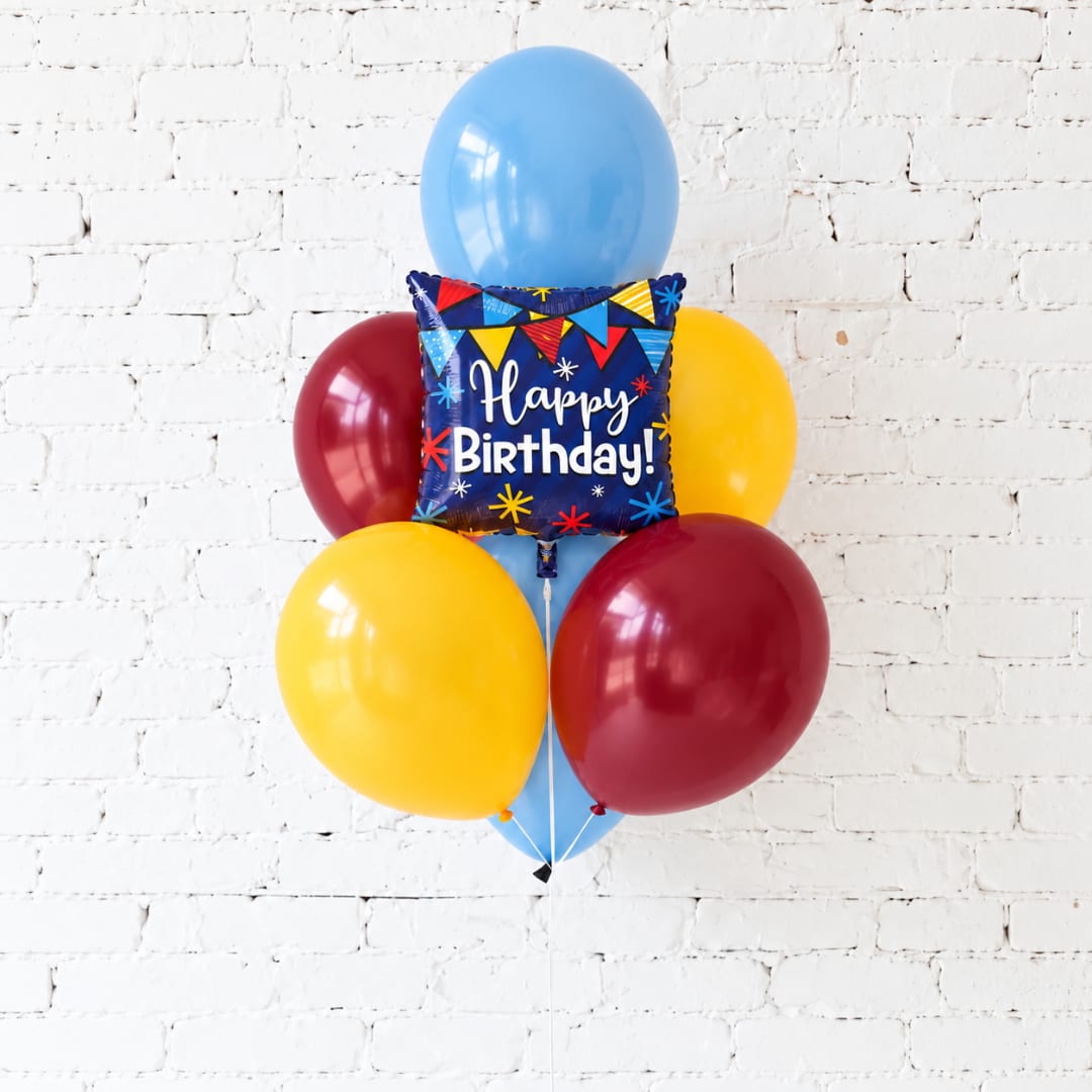 Birthday balloon bouquet with a square "Happy Birthday" balloon and colorful latex balloons