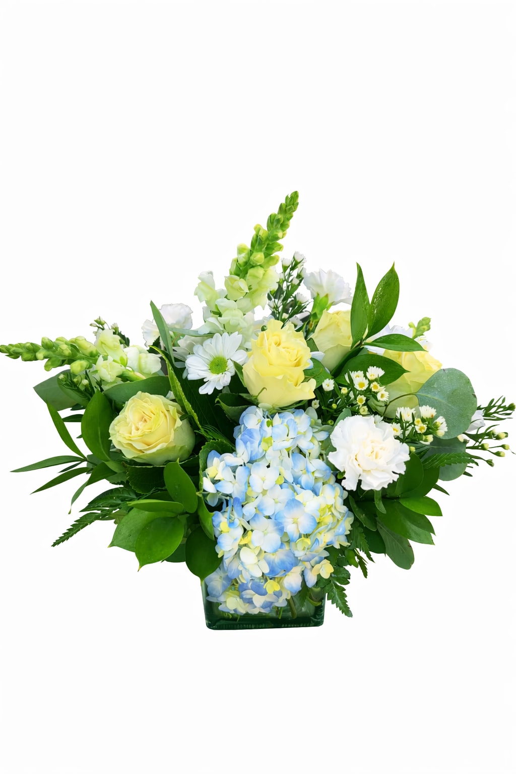 Yellow roses and blue hydrangeas in a glass vase