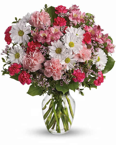 Pink and white mixed bouquet in a clear glass vase