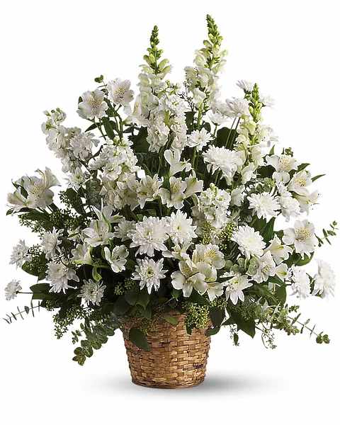 White flowers arranged in a woven basket