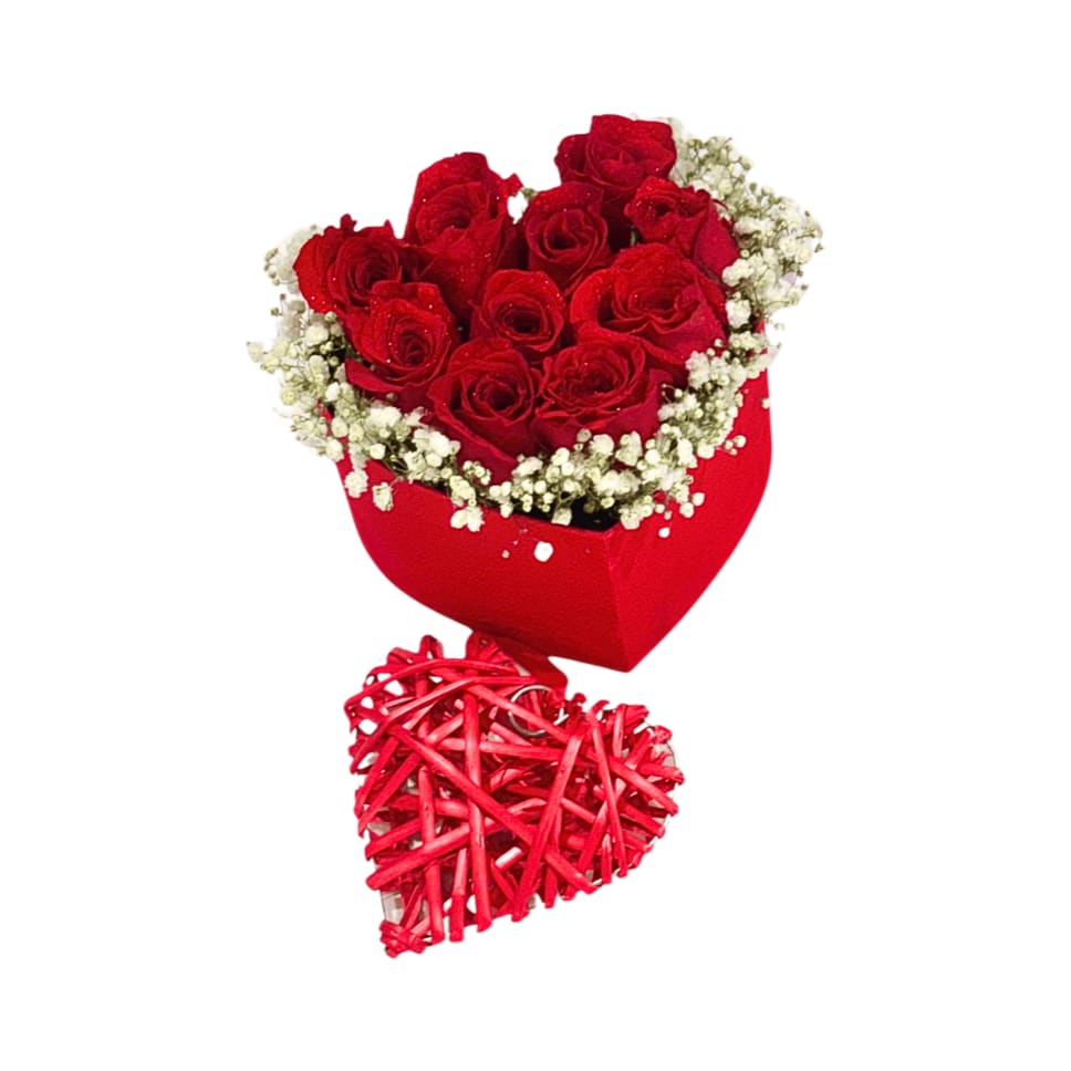 Red rose bouquet in a heart-shaped wrap with a woven heart hanger