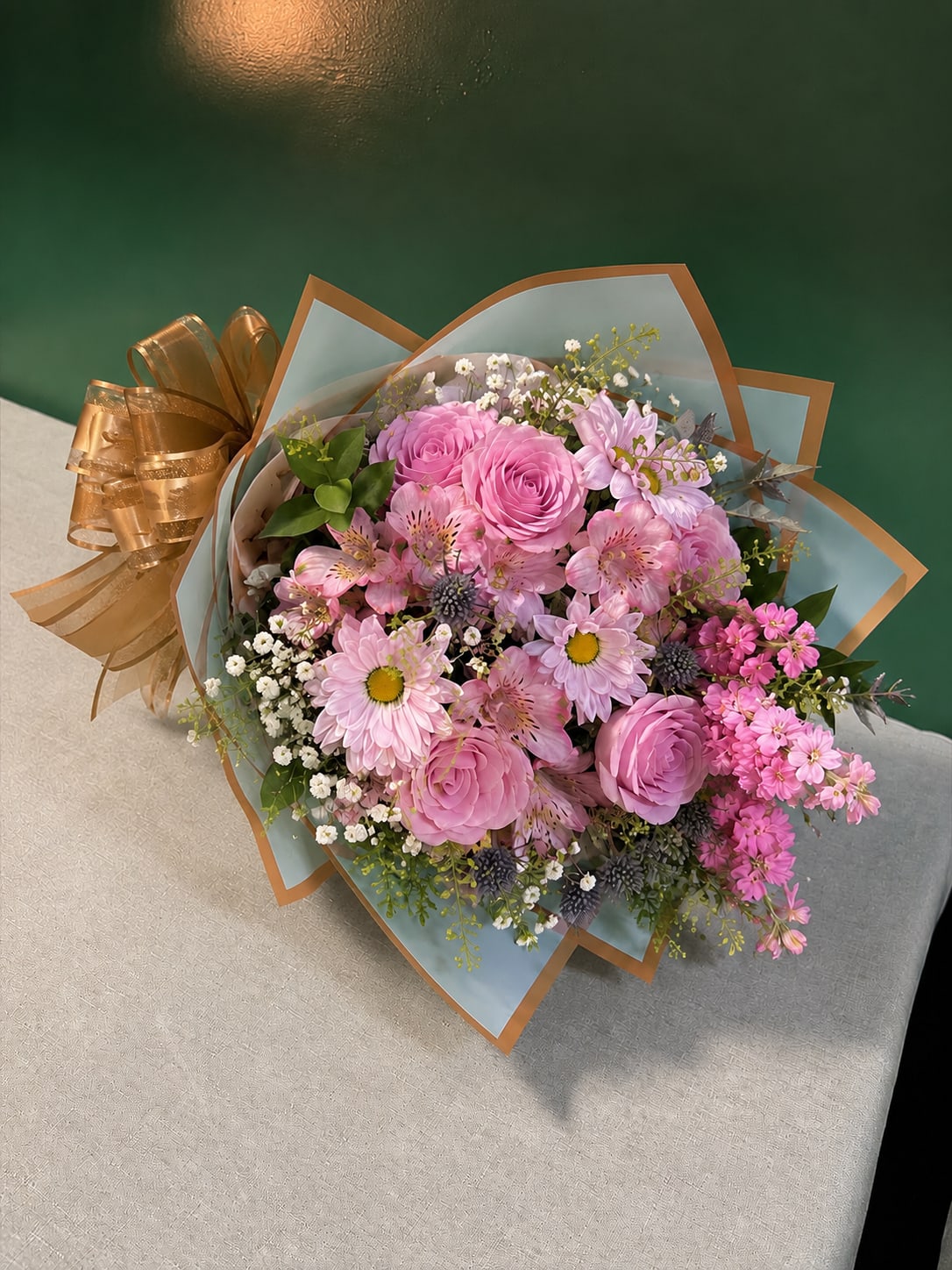 Blush Bloom Grab &amp; Go  - A fresh mix of pink roses and seasonal blooms, beautifully wrapped in our signature waterproof wrap and finished with a satin bow. Ready to gift and perfect for any occasion. 