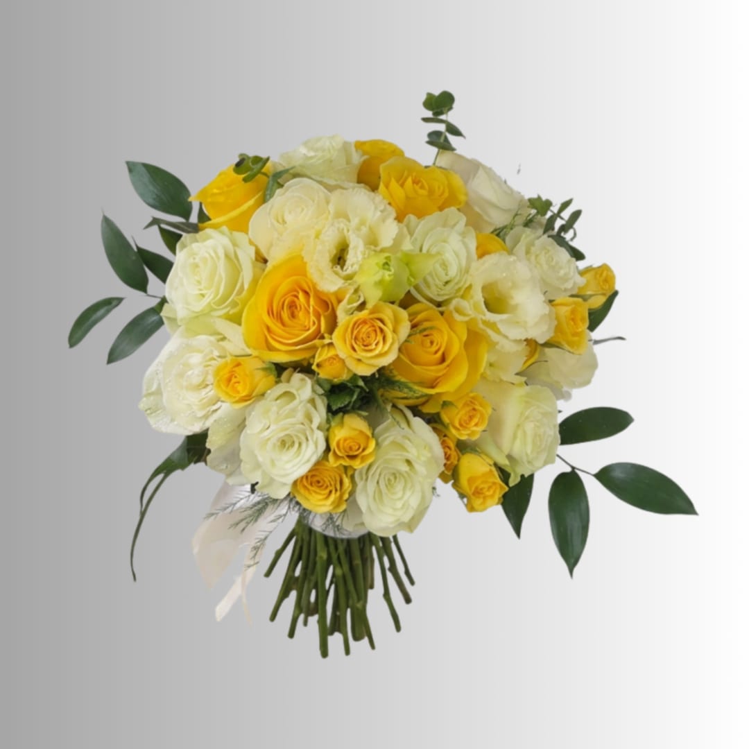Bouquet of yellow and white roses with greenery