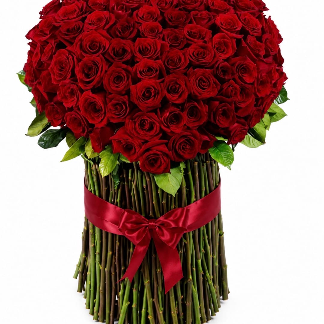 Large bouquet of red roses with a red ribbon around the stems