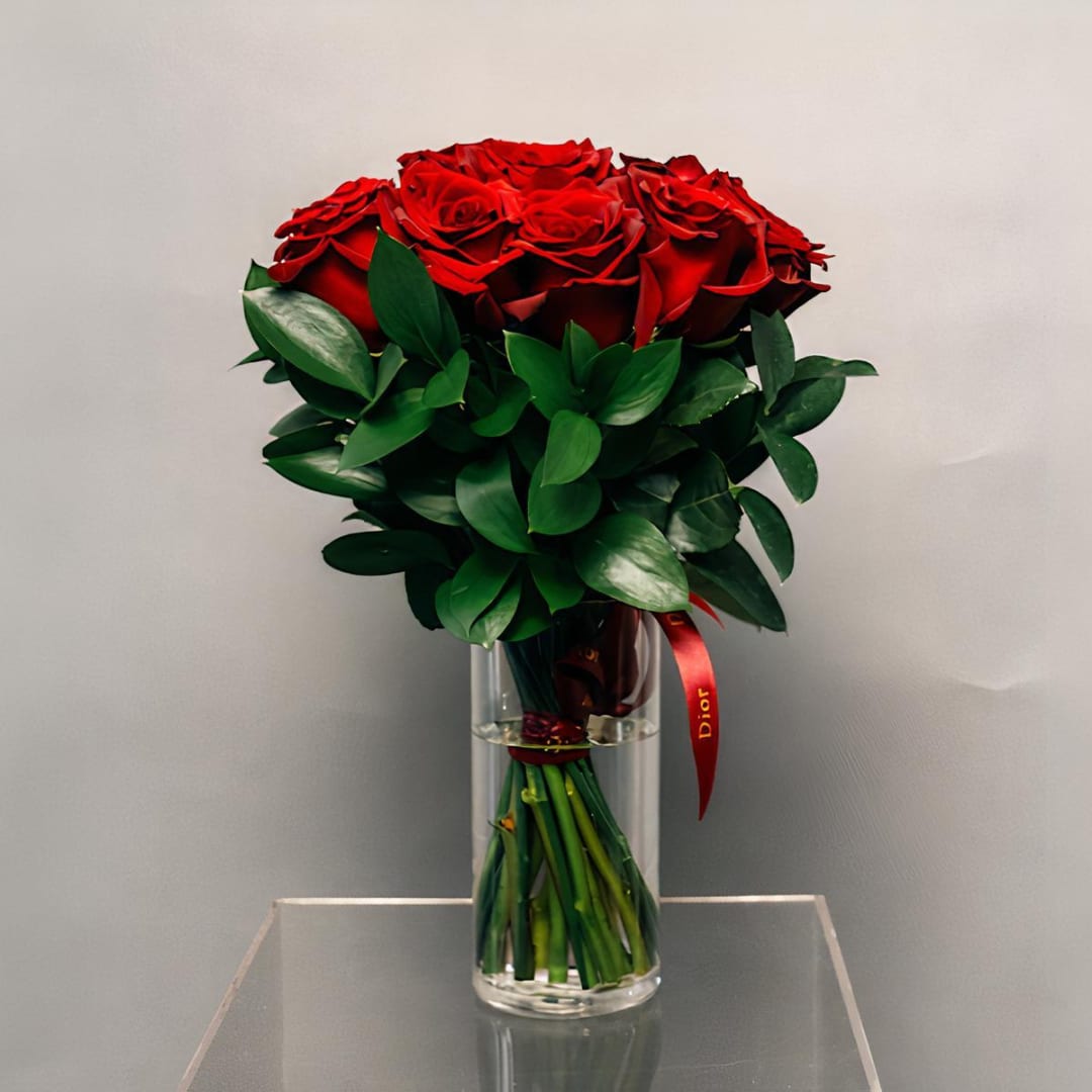 Bouquet of red roses in a clear glass vase