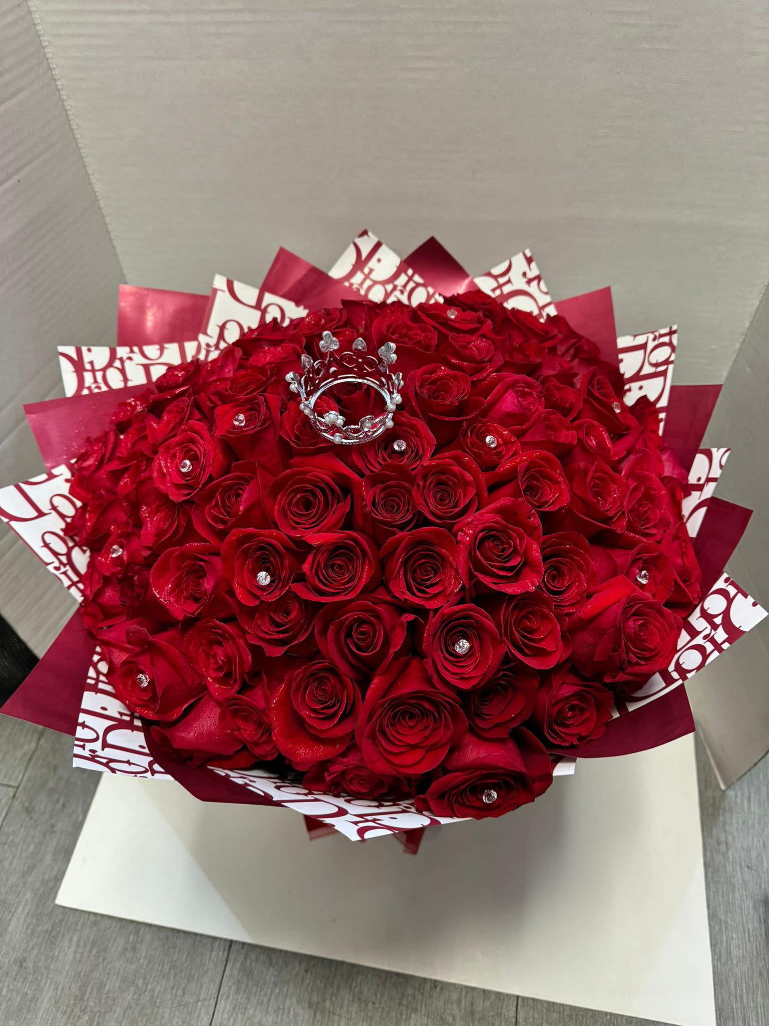 Infinity Bouquet  - In this bouquet of 100 red roses, romance overflows like a river of passion. Each rose is a symbol of fiery love and deep commitment, its silky petals capturing the essence of a soul in love and the timeless beauty of love.