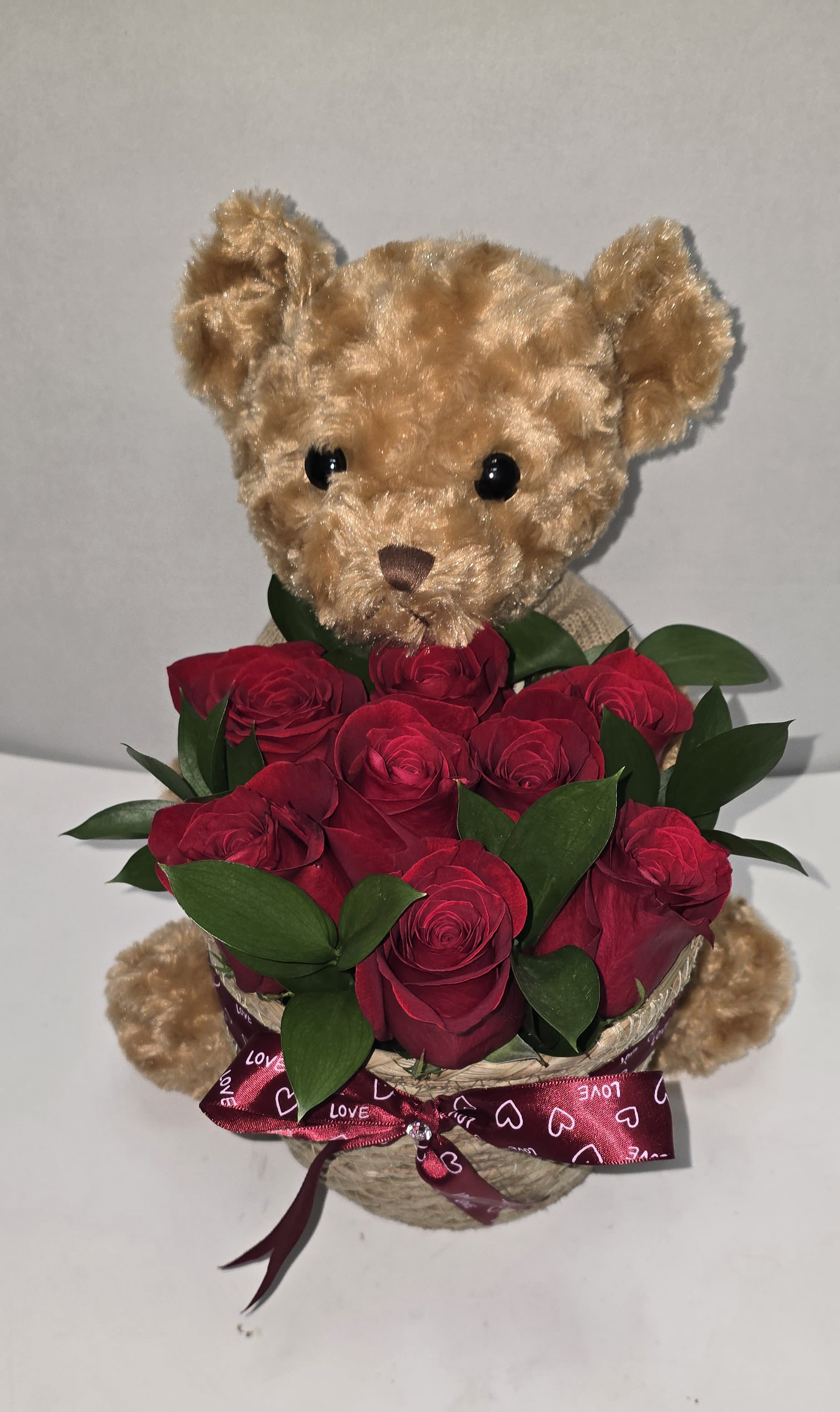 Teddy arrangement - Simply adorable teddy bear and roses a small but very meaningful arrangement