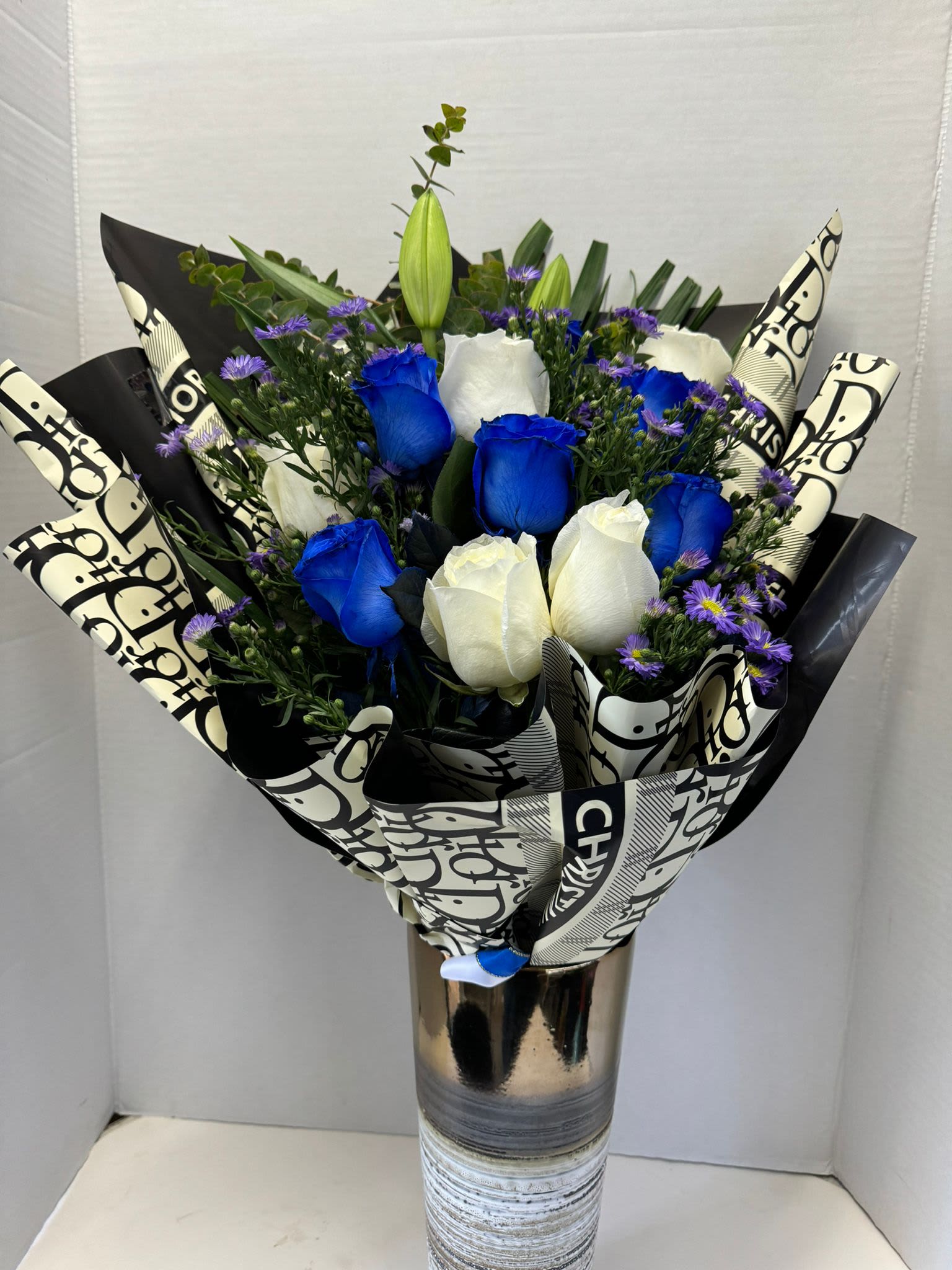 Blue and White Bouquet  - a dozen white and blue roses with white lilies a bouquet full of love for super fresh flowers.( vase not included)