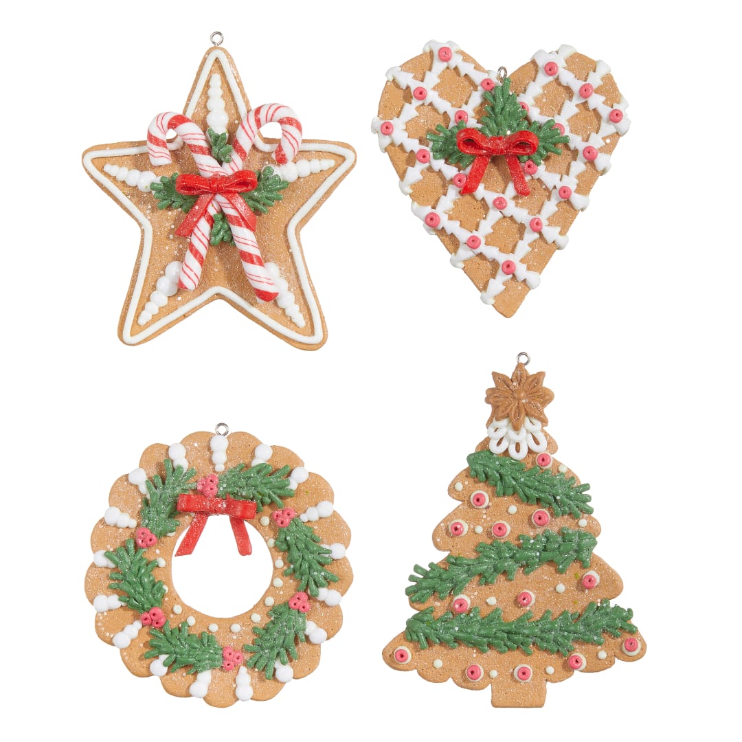Four decorated gingerbread Christmas ornaments on a white background