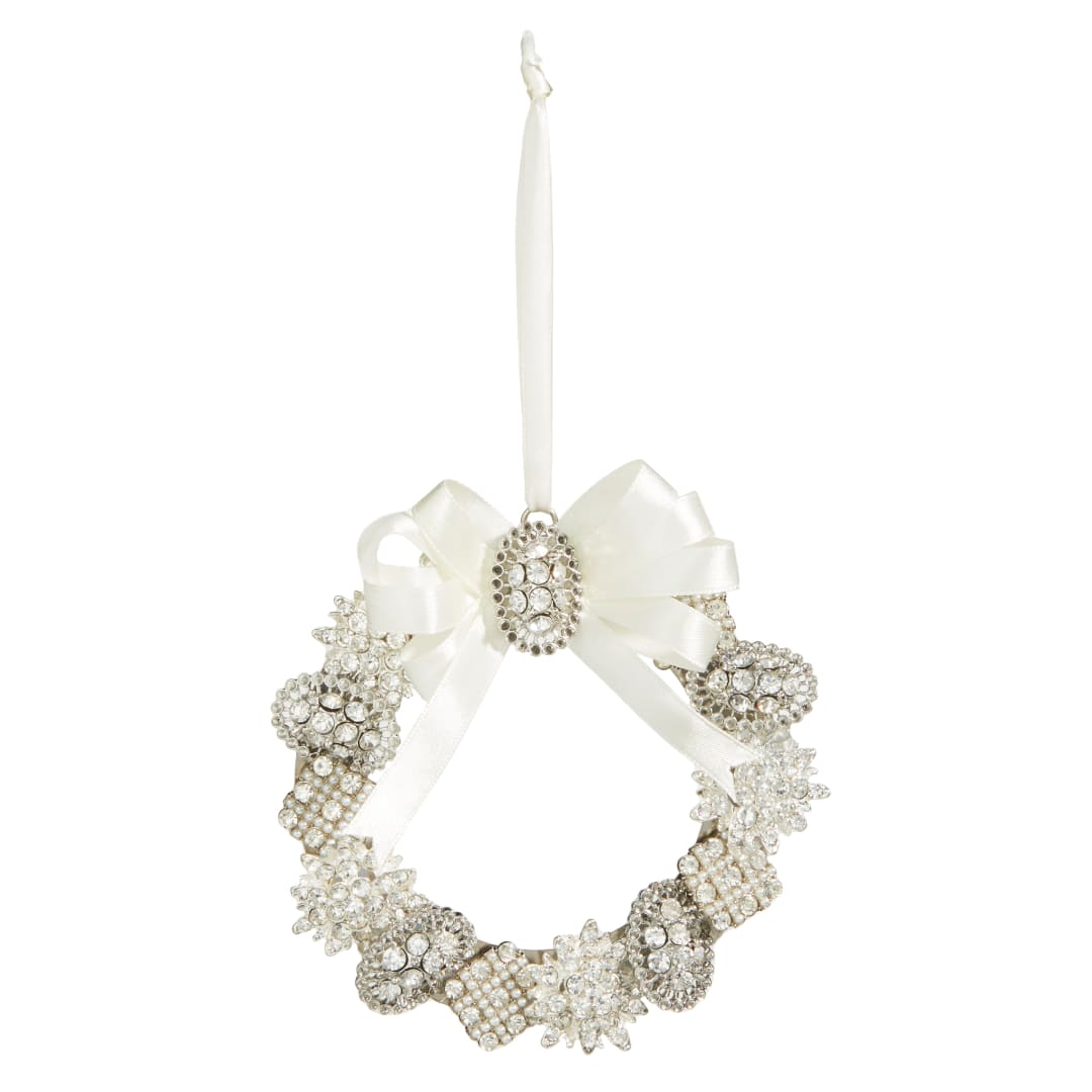 White decorative wreath ornament with a ribbon bow and hanging loop