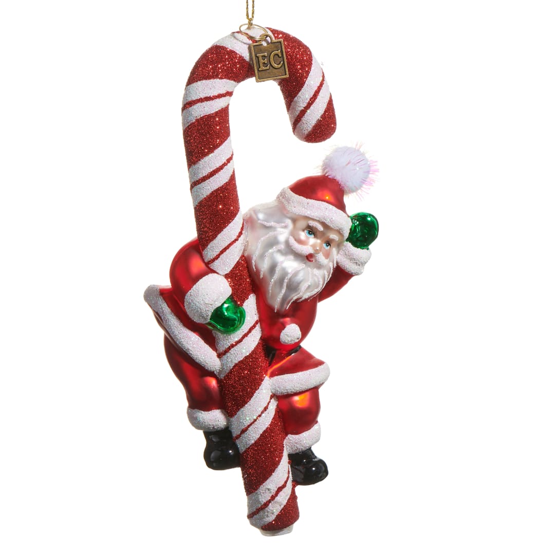 Santa ornament hanging on a red-and-white candy cane