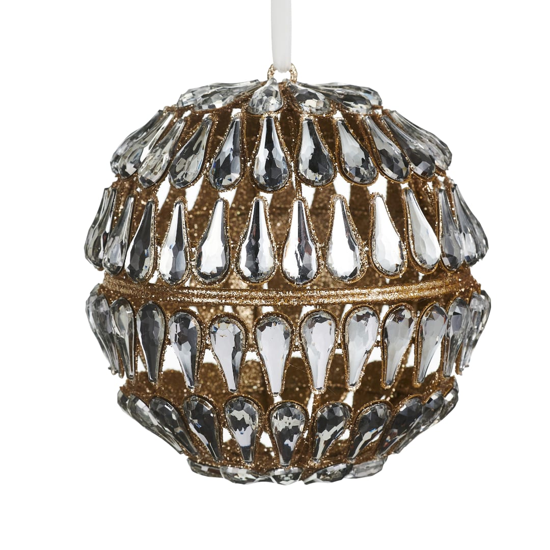 Ornate gold ornament covered in clear teardrop crystals