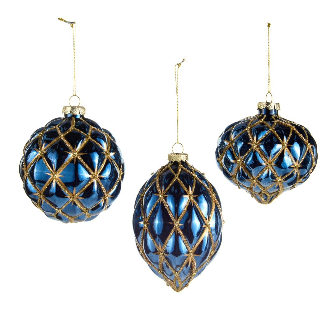 Three blue and gold hanging Christmas ornaments on a white background