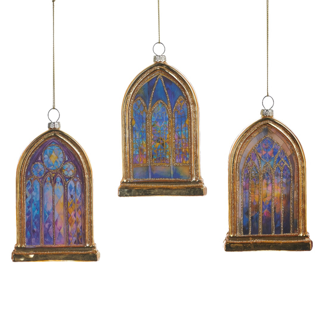 Three stained-glass style arched ornaments with gold frames hang on cords