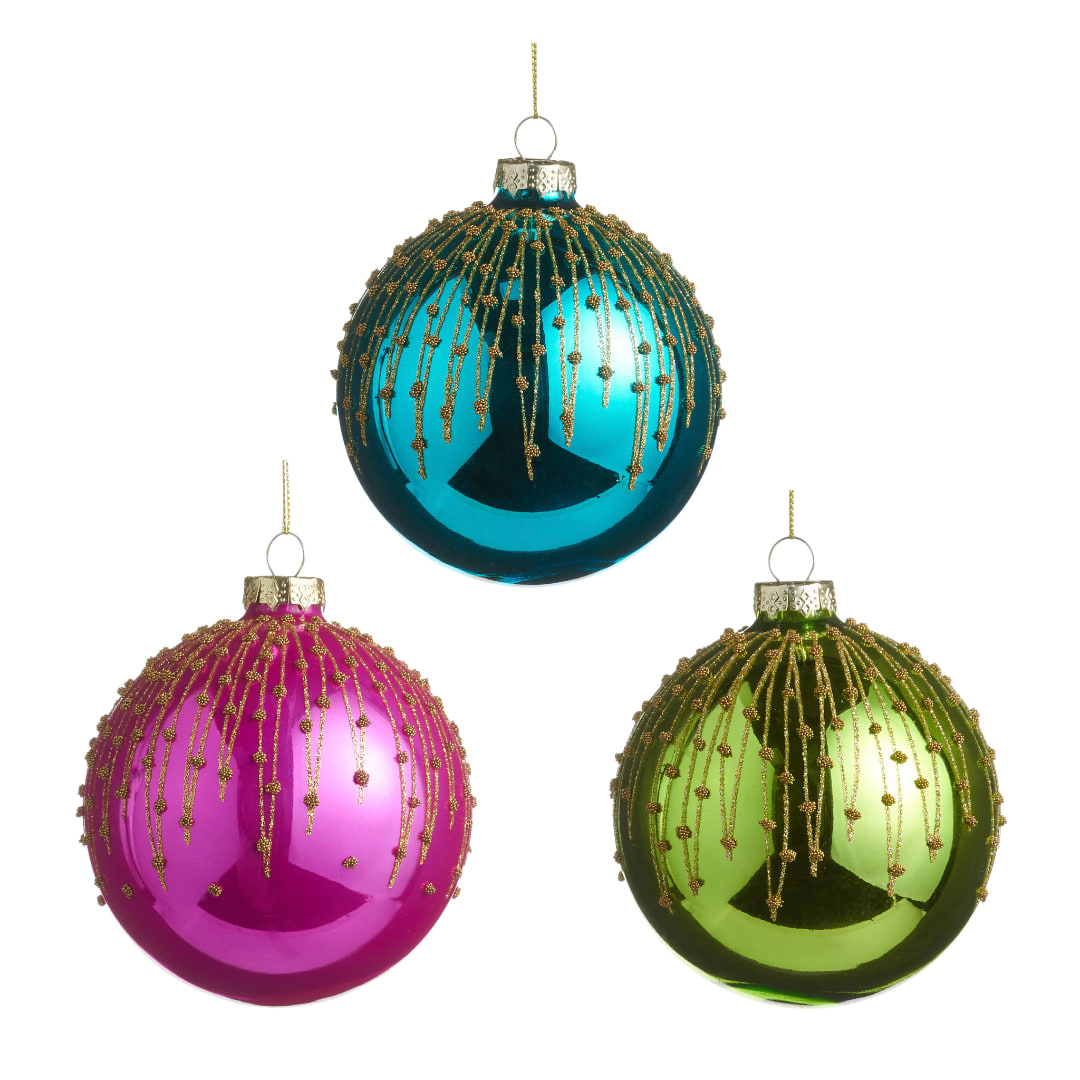 Three shiny Christmas ornaments in teal, pink, and green