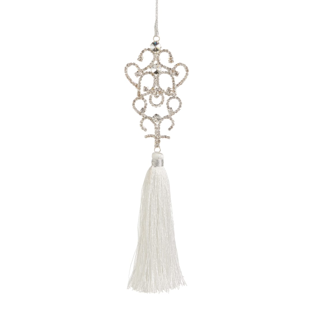 Decorative crystal ornament with a white tassel