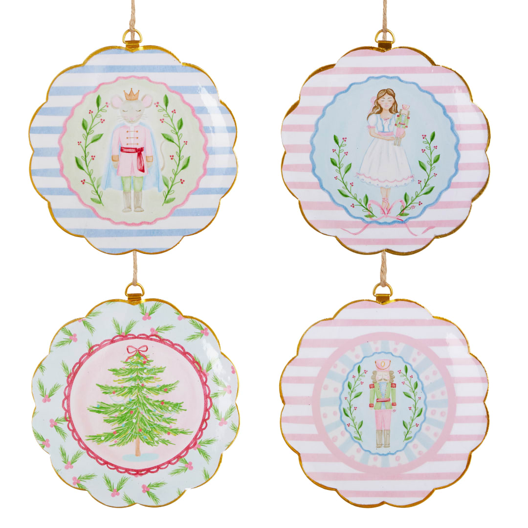 Four scalloped hanging ornaments with pastel nutcracker and tree illustrations