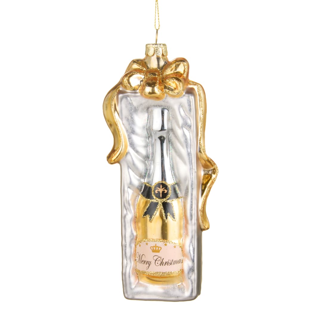 Gold and silver Christmas ornament shaped like a champagne bottle in a gift box
