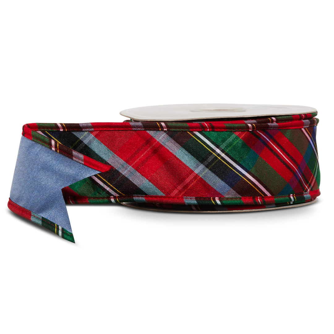 Spool of plaid ribbon with a loose blue tail