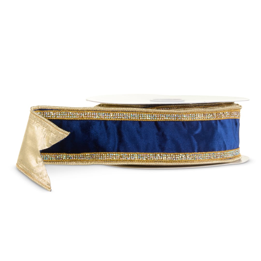 Blue and gold decorative ribbon spool on a white background