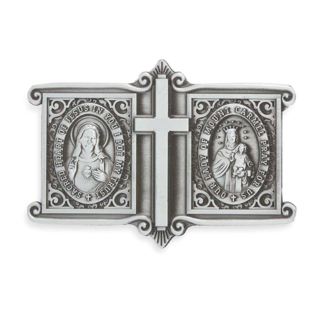 Silver religious plaque with a cross and two saint medallions