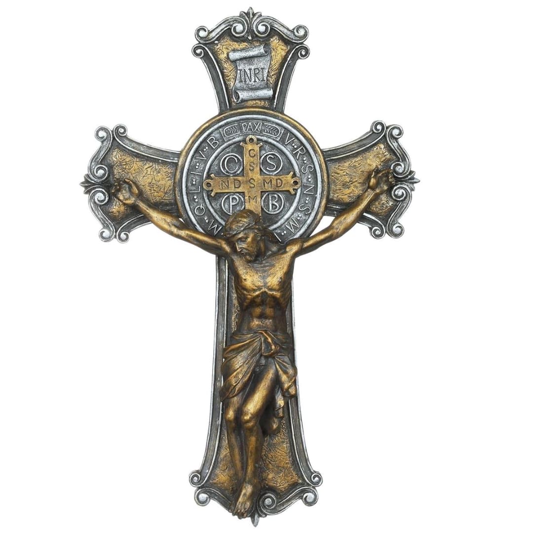 Decorative crucifix with a figure of Jesus on a white background