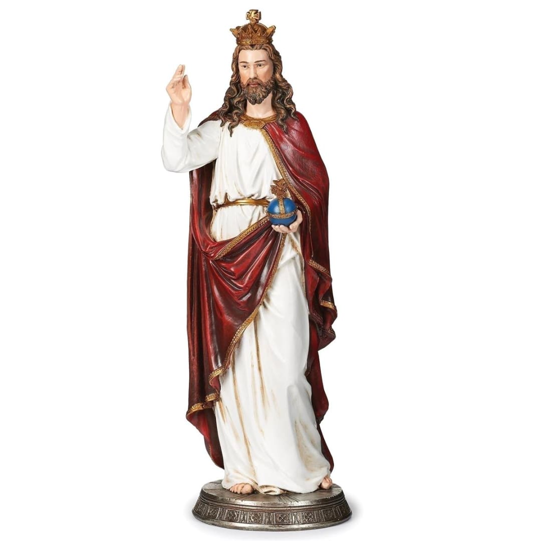 Statue of a crowned robed figure holding a blue orb