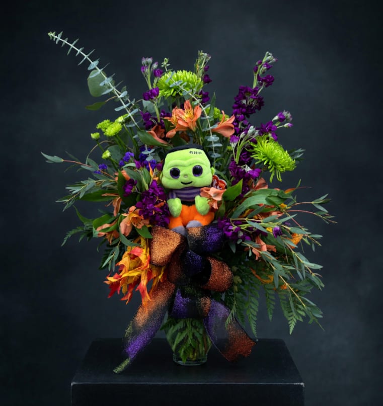 Halloween bouquet with a plush Frankenstein figure in a vase