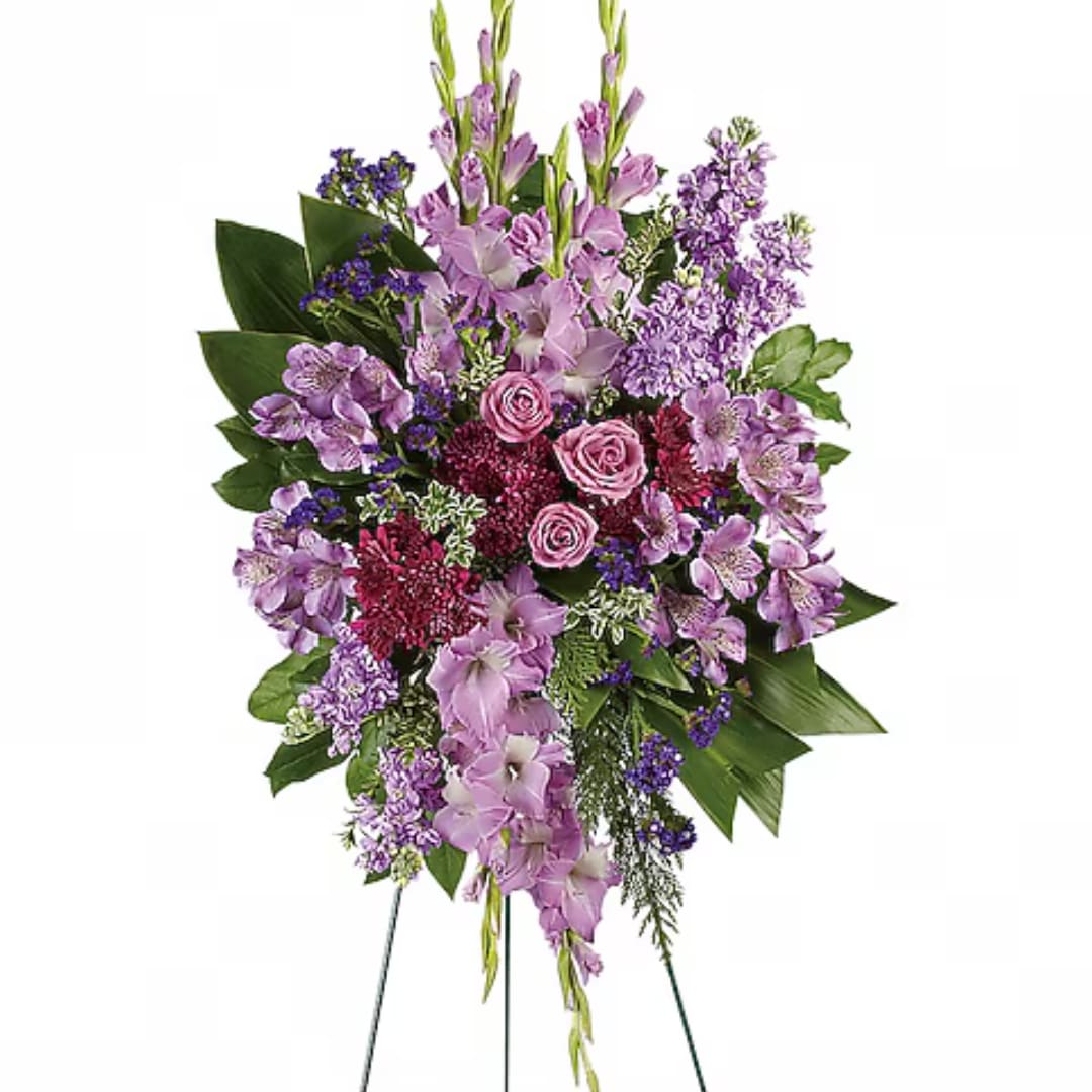 Lavender and pink floral standing spray with roses and orchids