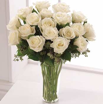 The White Rose Bouquet - Exquisite - Good - The beauty of white roses is unchallenged. Representing innocence, their versatility makes them a favorite gift to offer congratulations for graduation, engagements, bridal showers, new baby, or even a gift of sympathy.