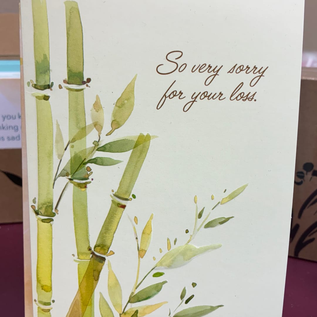 Sympathy gift card with bamboo and leaves and the message "So very sorry for your loss."