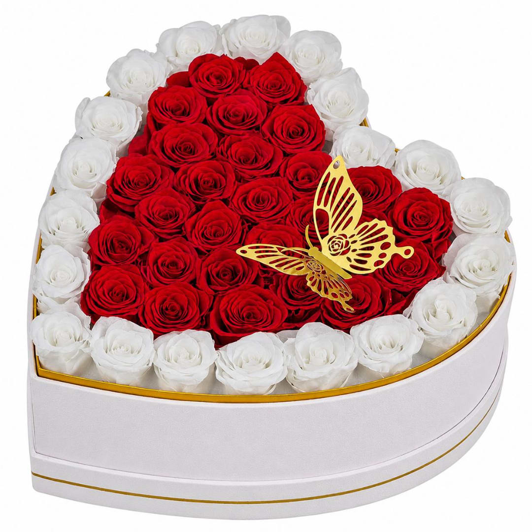 Heart-shaped box of red and white roses with a gold butterfly topper
