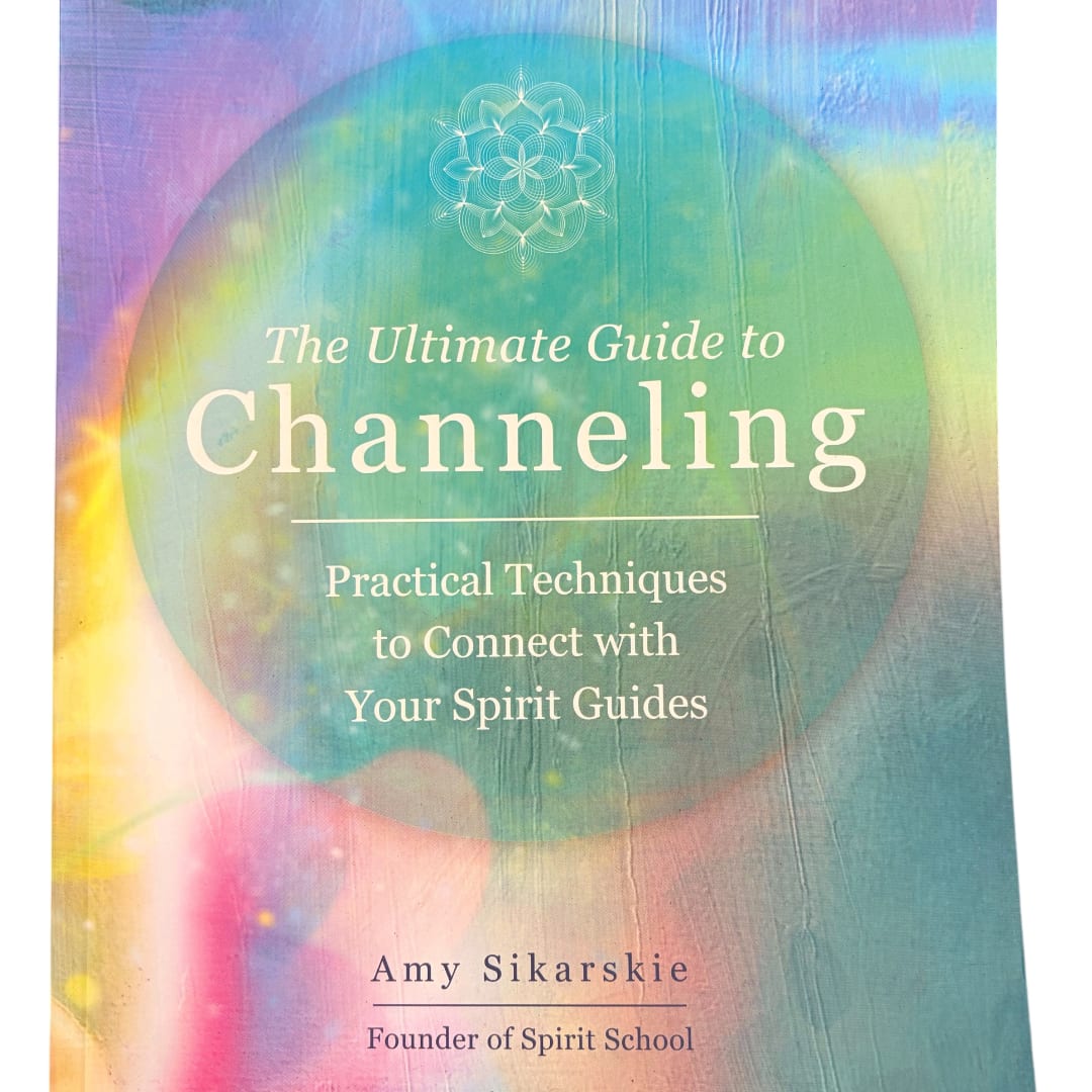 Colorful book cover with the title "The Ultimate Guide to Channeling"