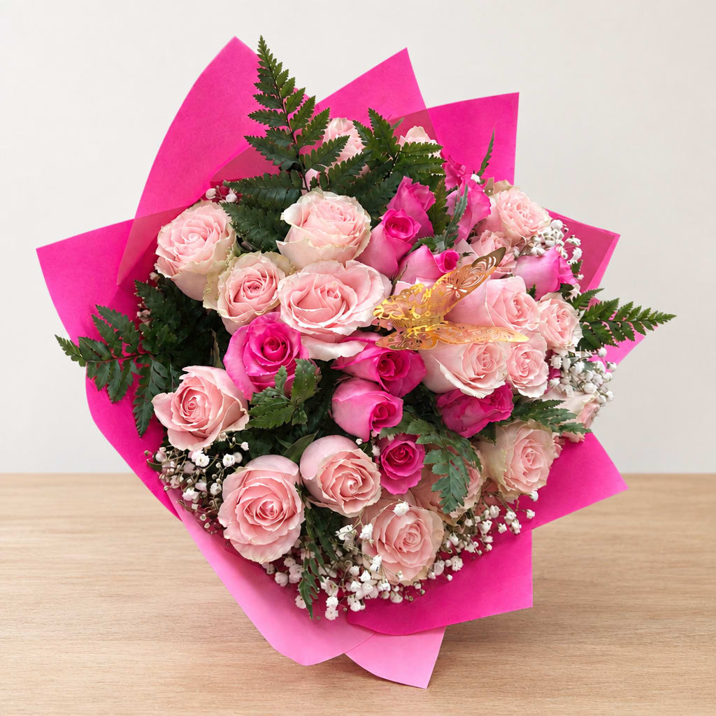 Bouquet of pink roses wrapped in bright pink paper