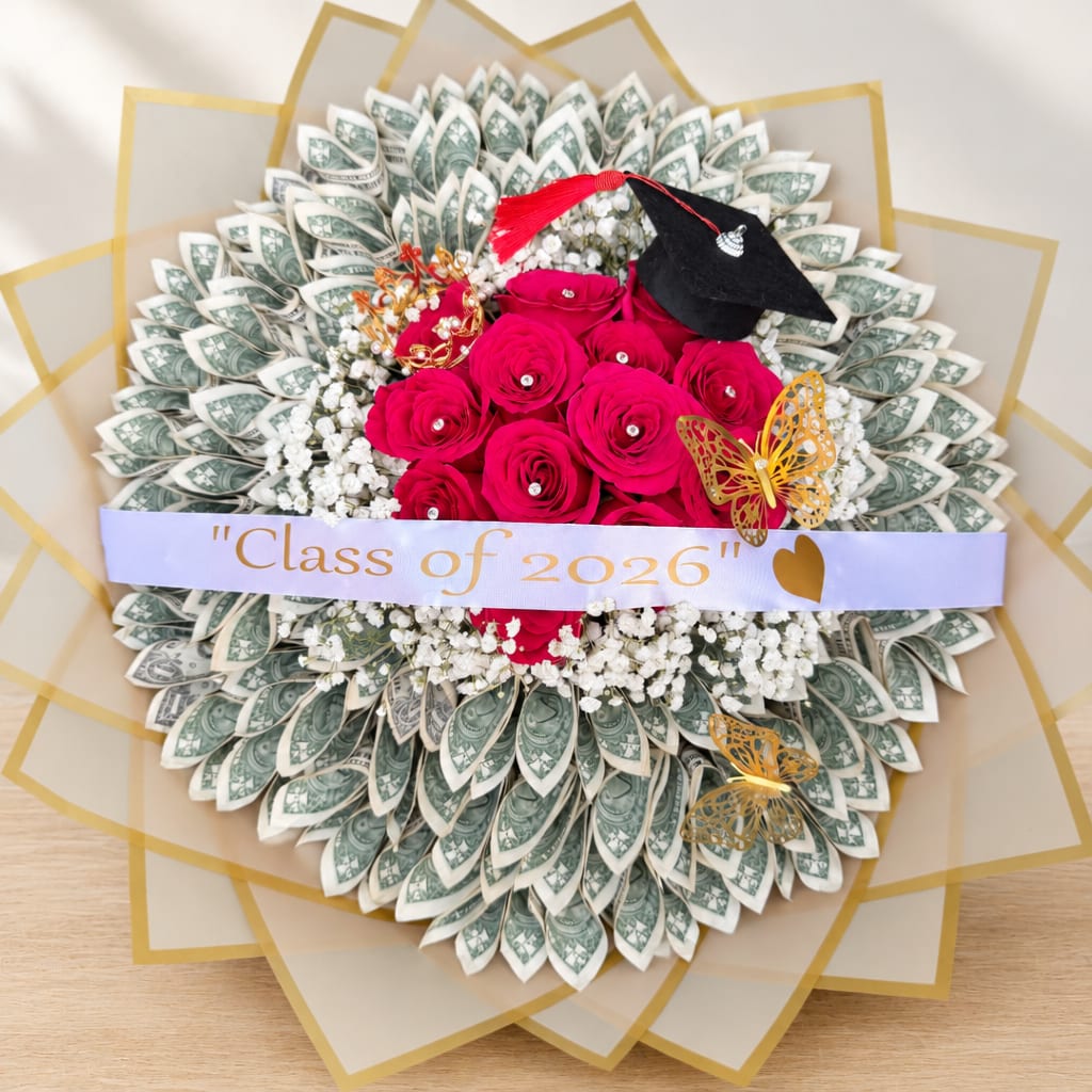 Bouquet of pink roses with a graduation cap and "Class of 2026" ribbon