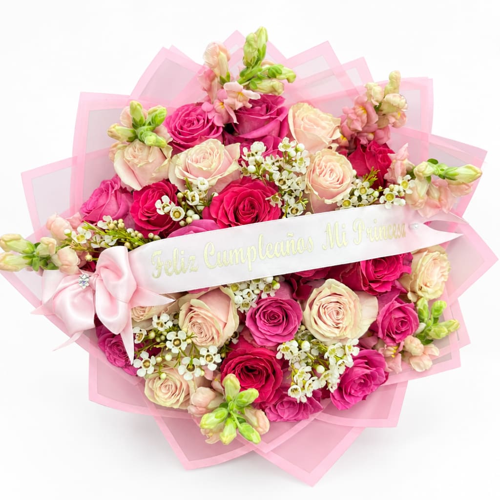 Pink and cream rose bouquet with a ribbon and bow