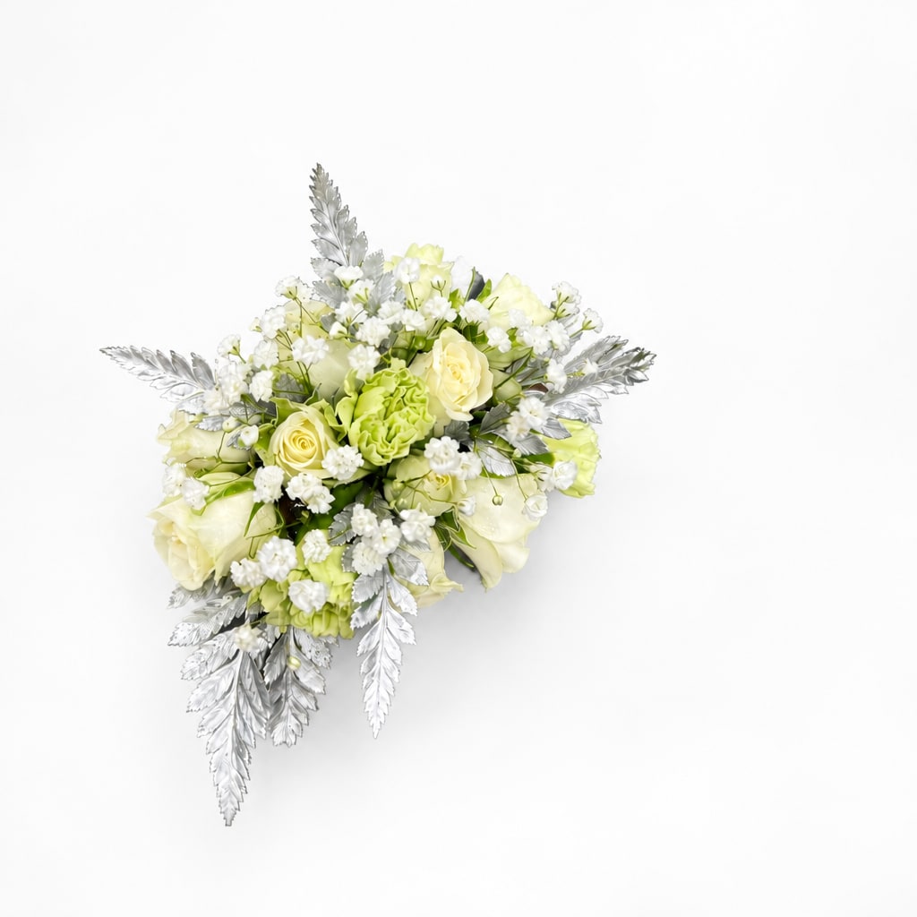 White and pale green bouquet with silver foliage on a white background