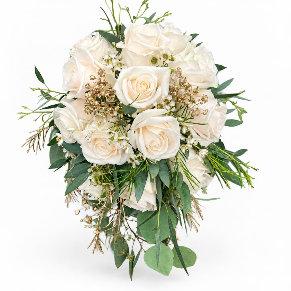 White rose bouquet with green foliage and small gold accents