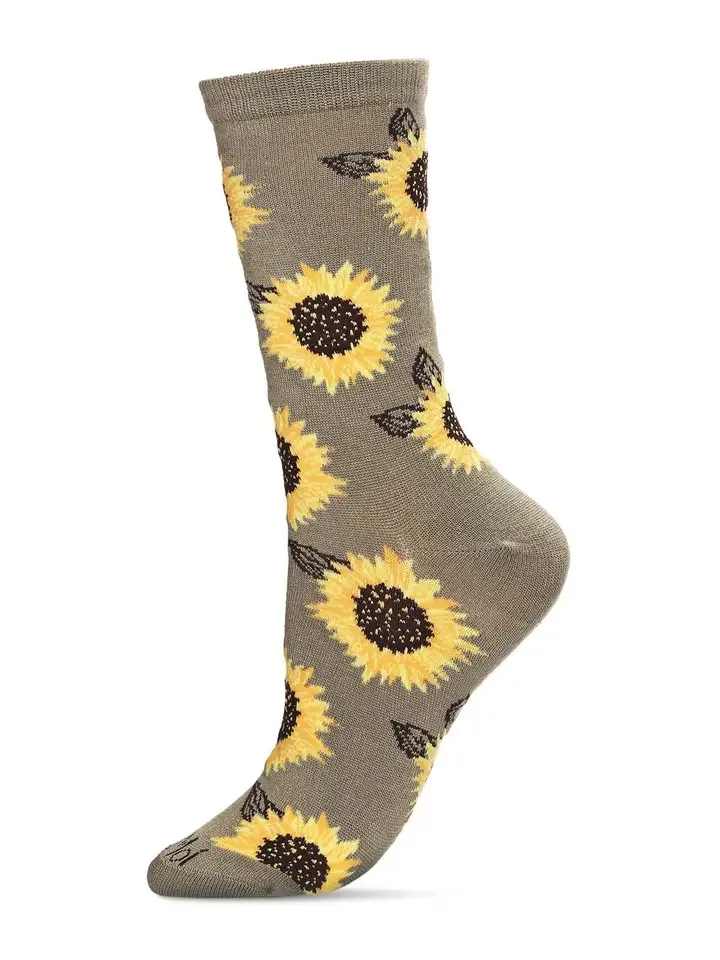 Majestic Sunflower Bamboo Blend Crew Socks - Sunflowers are known for being bright, cheerful, and happy-looking flowers. Who wouldn't love receiving a bouquet of these beauties?! Display your love for sunflowers on your feet with our Majestic Sunflower Bamboo Blend Crew Socks. They're made from a soft bamboo blend that gets even softer with each wash cycle. Plus, they are made from sustainable and eco-friendly materials.