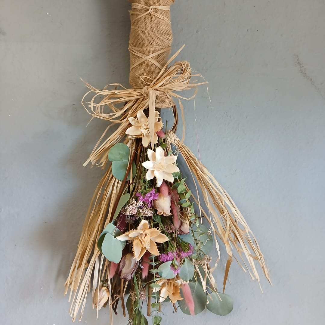 Dried floral bundle with cream flowers and raffia bow