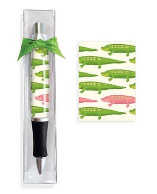 Pen in clear packaging with green crocodile pattern and bow
