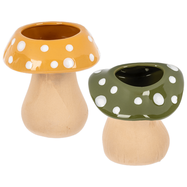 Two polka dot mushroom-shaped ceramic planters