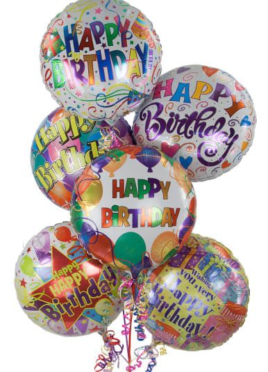 Cluster of colorful birthday balloons with printed messages