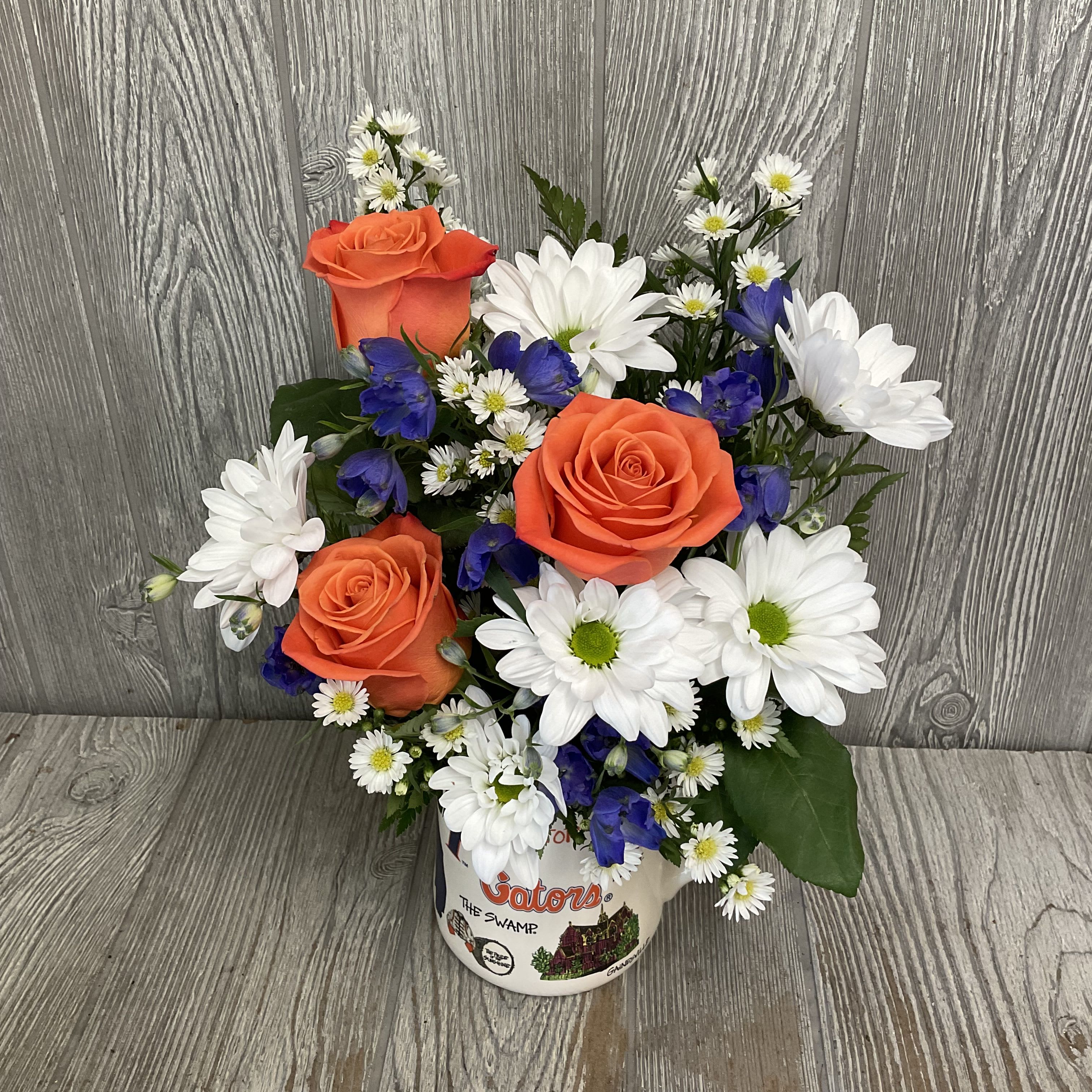 Iconic Gator Mug - Mixed fresh flowers arranged in a ceramic keepsake Gator mug! Flowers may vary. 
