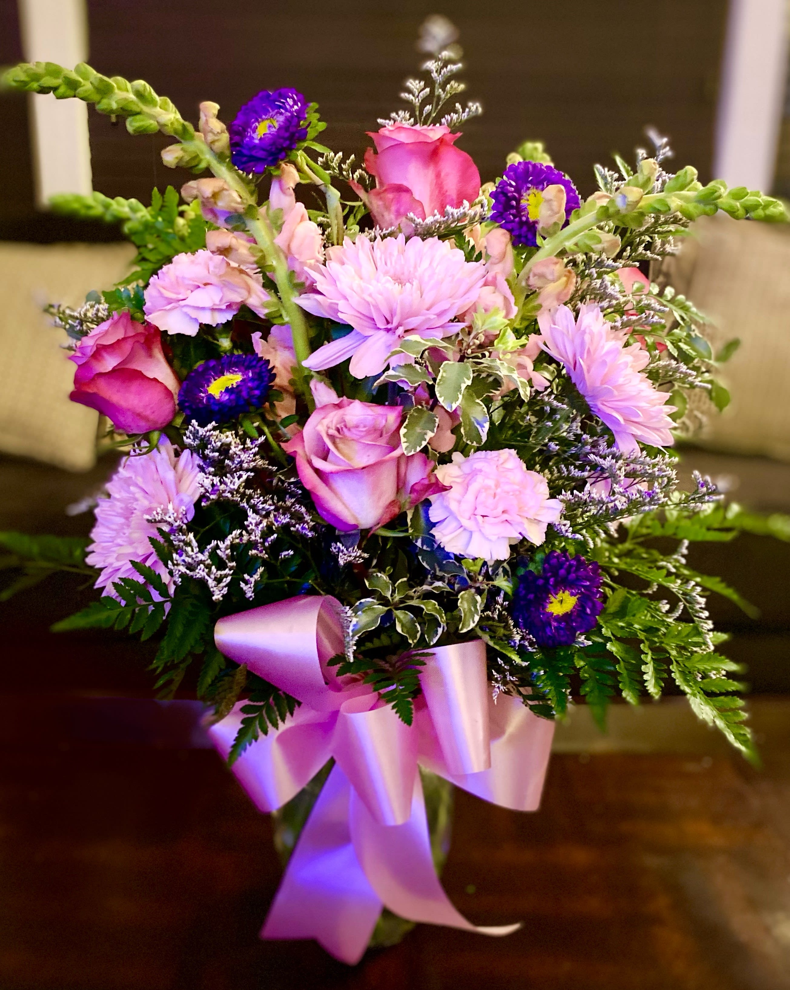 Pink and purple mixed bouquet with a satin ribbon