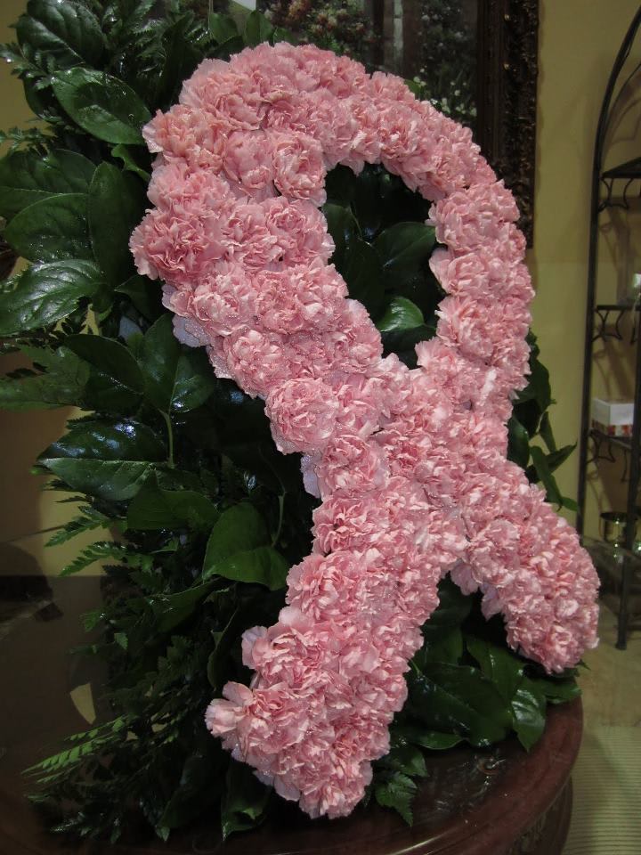 Pink Ribbon Tribute  - All items featured on this Web site represent the types of arrangements we offer	and may vary depending upon availability in certain regions.