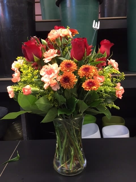Autumn Elegance Bouquet - This stunning bouquet features red roses and a mix of fresh Autumn flowers. Makes for a great gift for a loved one during the Autumn season. Can also decorate your coffee table, dinner table, and more!