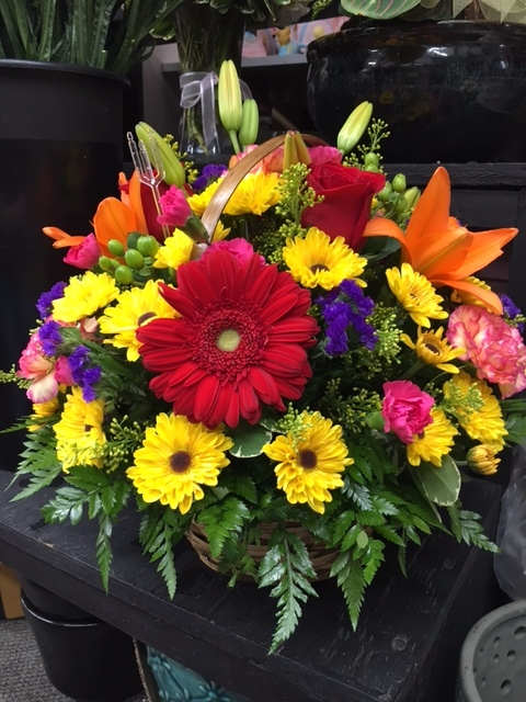 Autumn Basket Arrangement - A gorgeous, generous sized basket arrangement that will make quite the impression. A beautiful mix of fresh Autumn flowers hand-crafted and designed in a beautiful brown wicker basket. Makes for a great gift, great for every special occasion, or even just decorate your own home! A must have during the Autumn season.