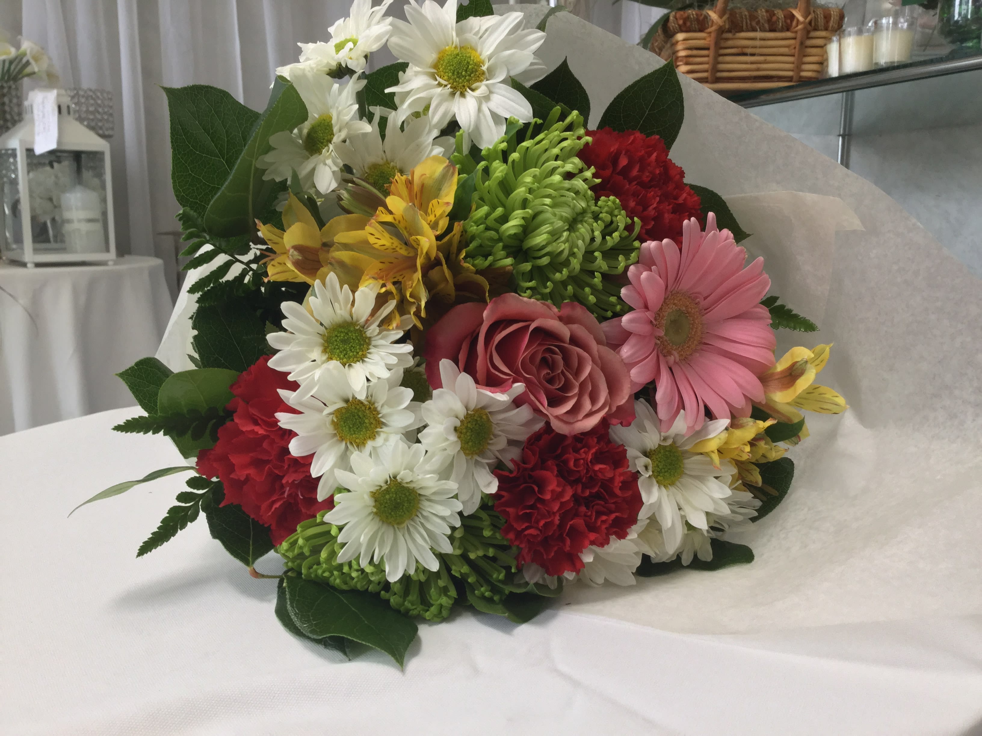 I Love You More Bouquet - This stunning bouquet of fresh mixed flowers is full of life, love and happiness. Gift it to your special someone just because, or treat them to a wonderful bouquet for Valentine's Day. No matter the occasion, it'll be sure to put a smile on their face. Must put in vase the same day. Change water daily. 